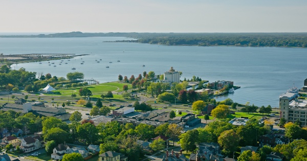 Aerial view of Muskegon Lake in Muskegon, MI on sunny day